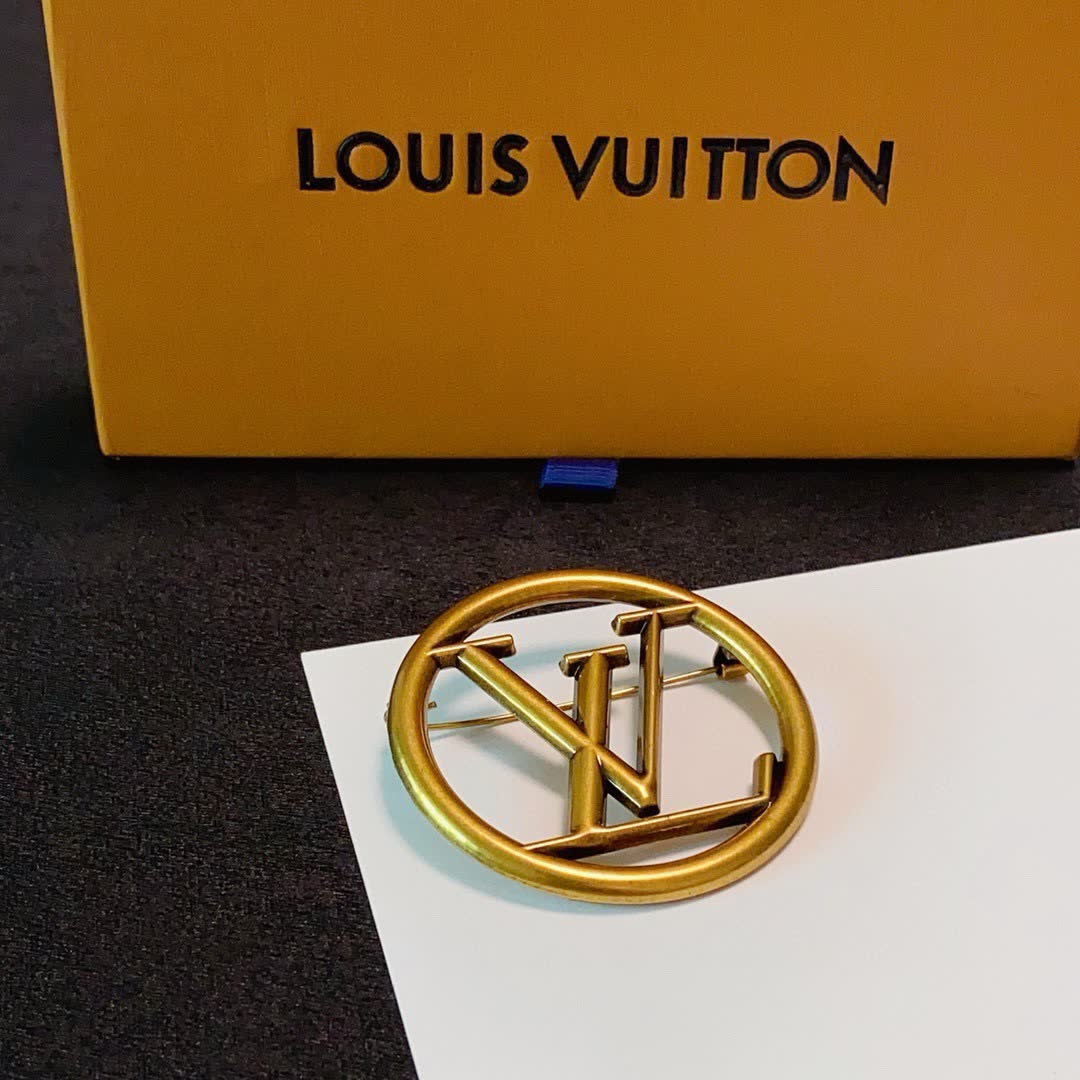 Louis Vuitton Gold Tone Logo Brooch